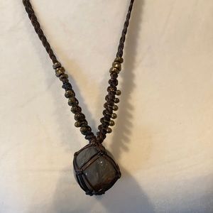 Leather, brass and crystal handmade necklace.